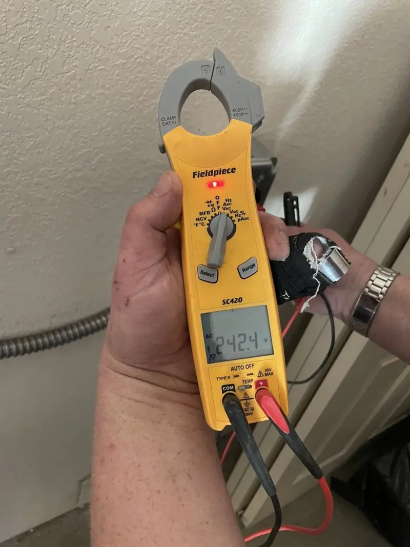 Voltage testing with clamp meter during Outlet Installation in Wilmington